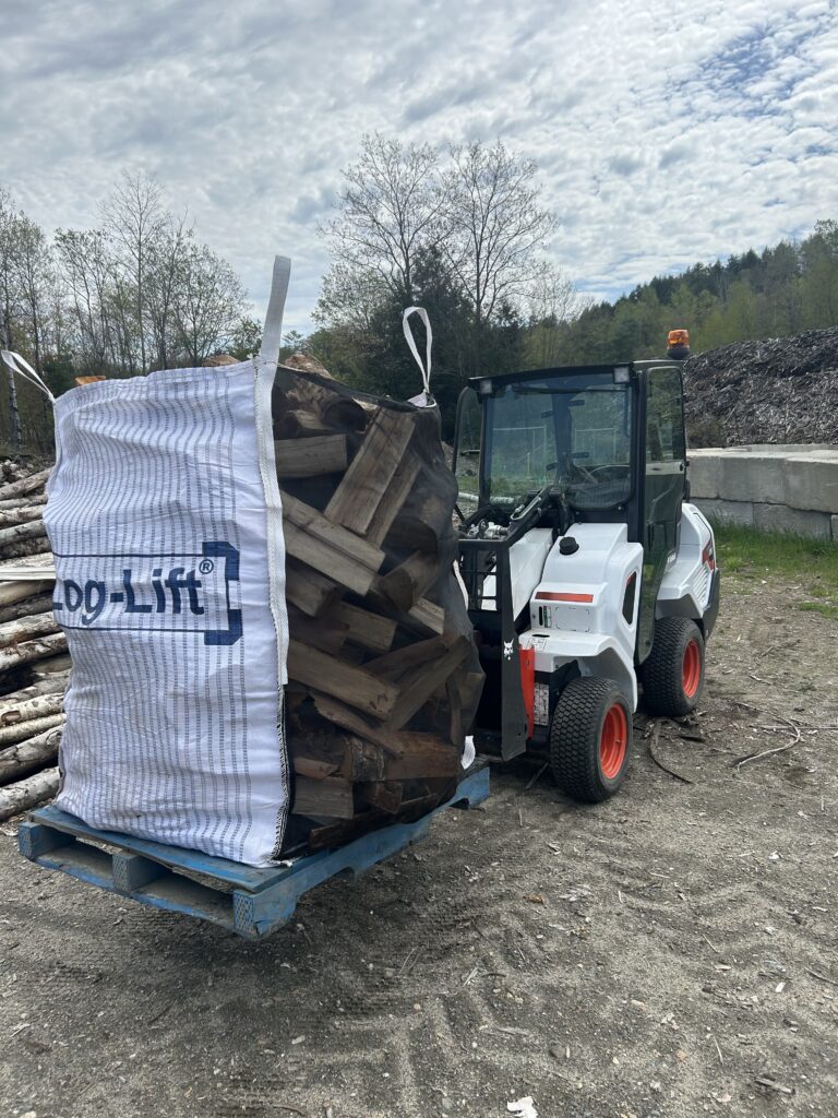 Mini loader with third cord bag.